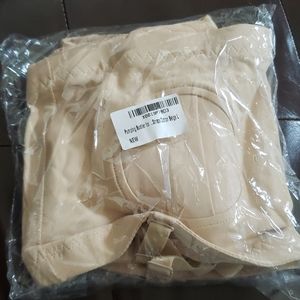 2 Hands free pumping bras with 2 bra extenders